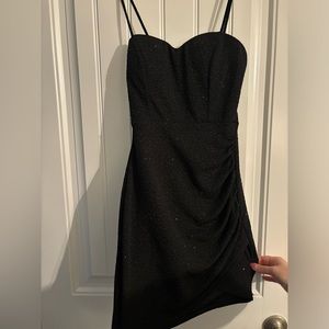Small short teens dress. Black with shimmery and stretchy fabric.